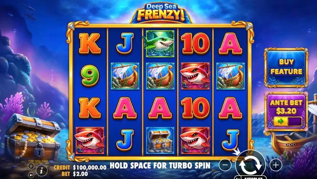 Deep Sea Frenzy slot base game showing 5 reels with shark symbols, treasure chests, ships, and card royals on an underwater background